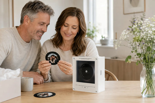 Couple choosing a custom photo mini record for a personalized wedding gift